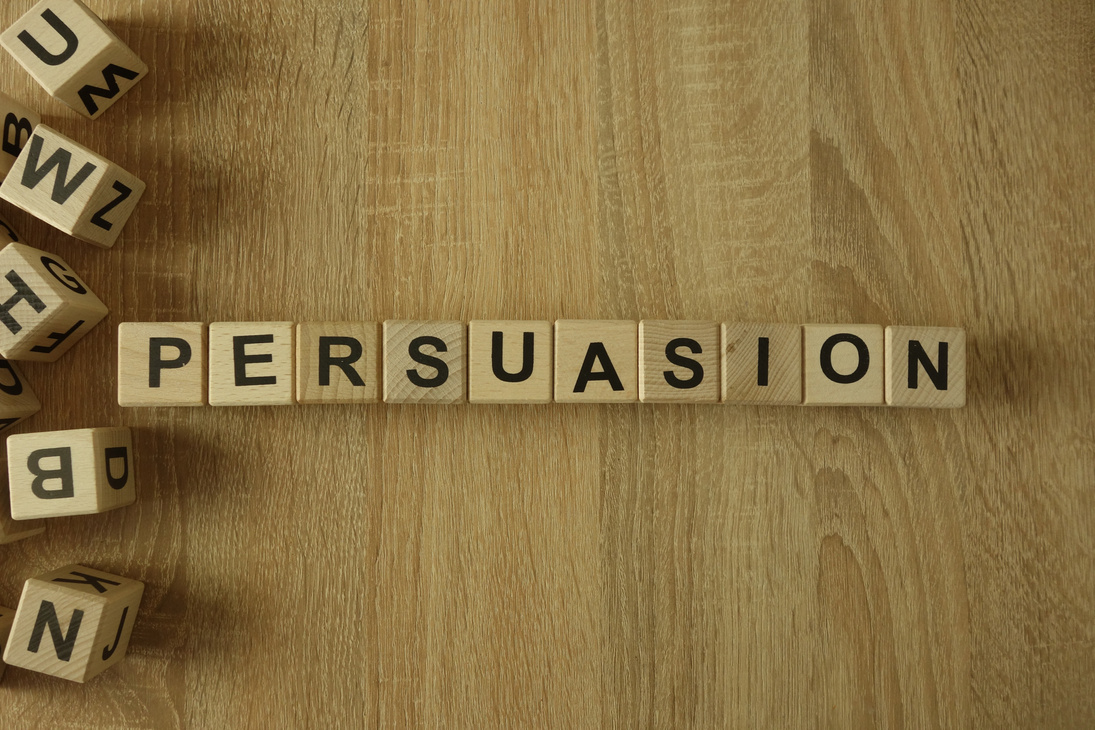 Persuasion word from wooden blocks